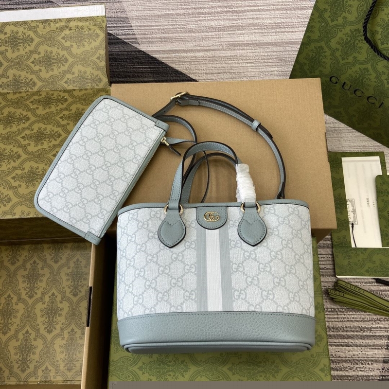 G*u*i shopping bags